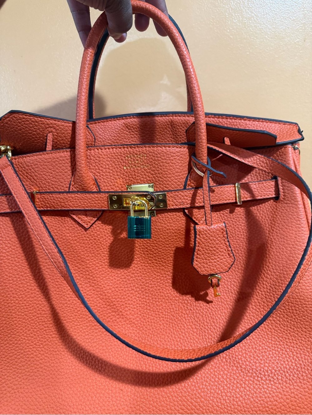 Hermes Coral Orange Pebbled Tote with Gold Hardware and Teal Padlock